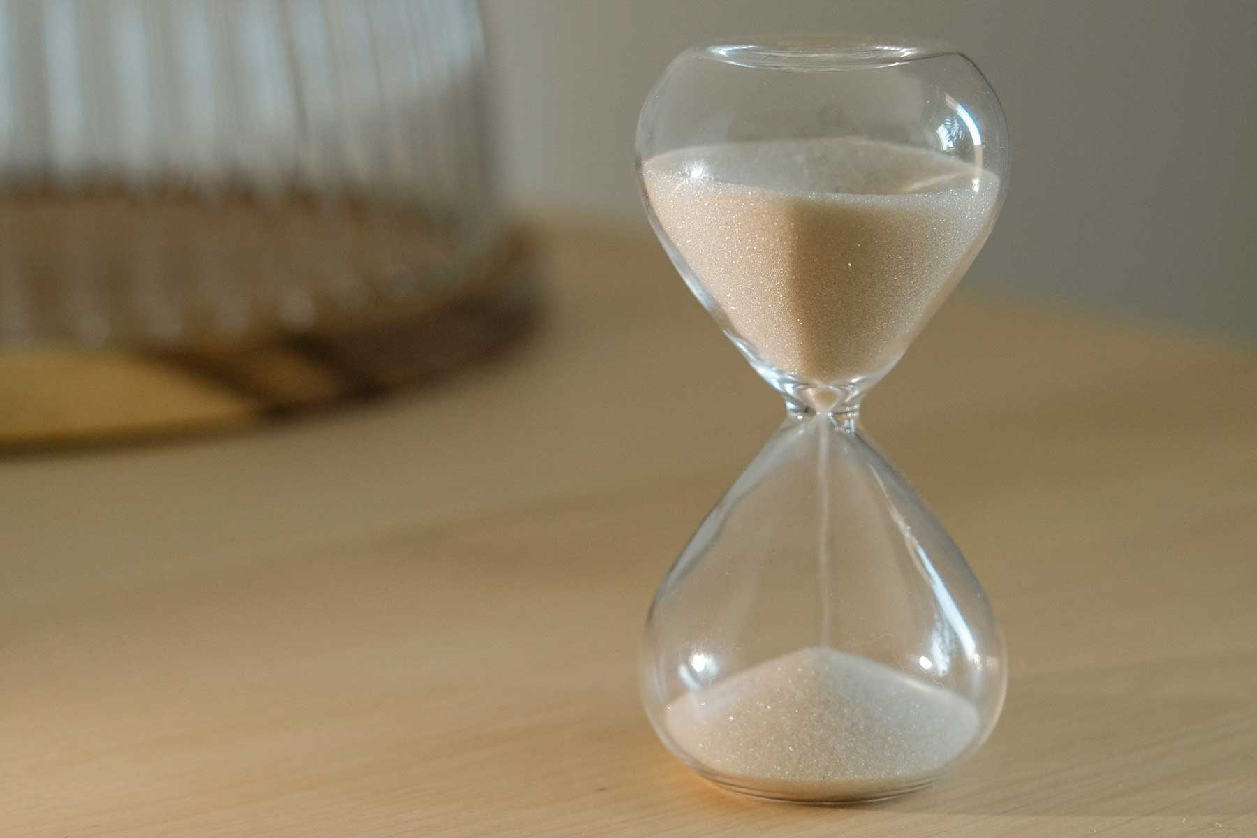 Hourglass in a table